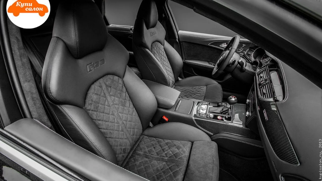 Перетяжка салона Audi RS6: сиденья, центральная консоль, руль, карбоновые вставки, черная кожа и алькантара.